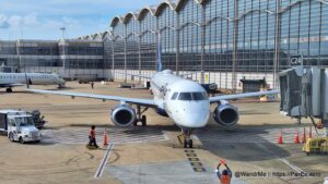 a plane parked in a terminal