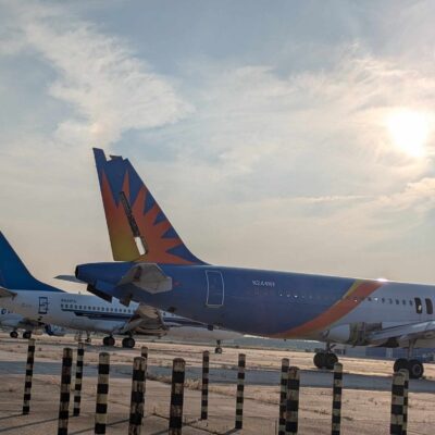Busted planes on the ground, stripped of parts as part of their demise.