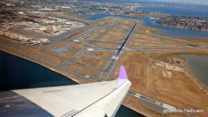 Wingtip over Boston Logan on departure