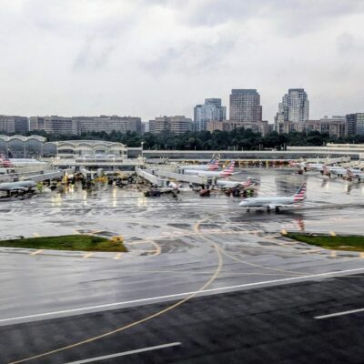 planes on a wet airport apron