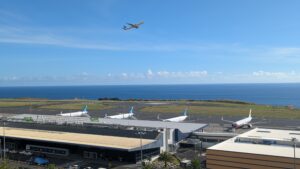 plane taking off over PDL airport