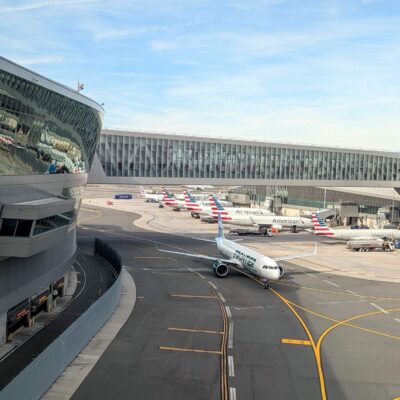 Plane on a taxiway in front of the terminal