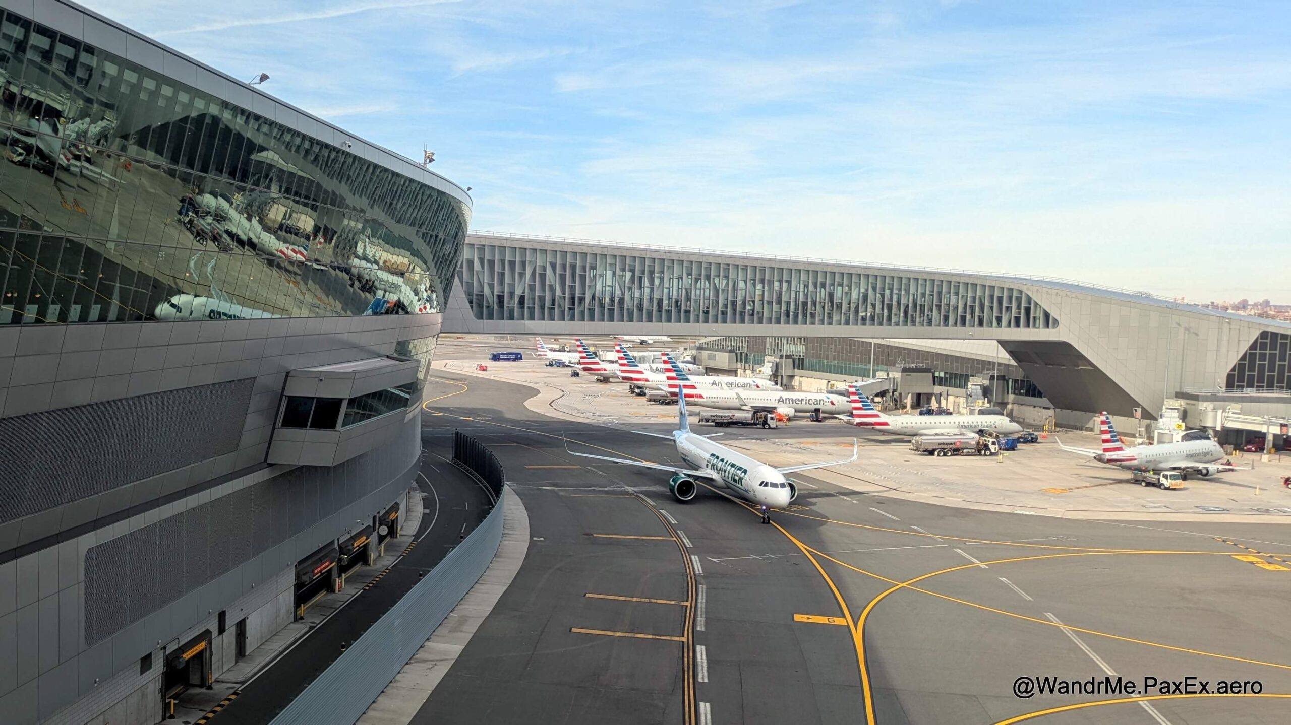 Plane on a taxiway in front of the terminal