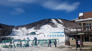 Ski slopes views from the base on a blue sky day