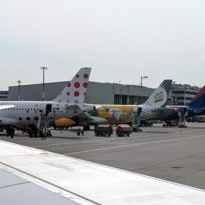 plane tails at an airport.