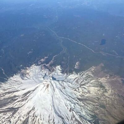 flying over a snow-covered mountain