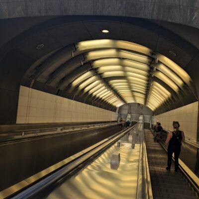 Escalators descending into a subway station